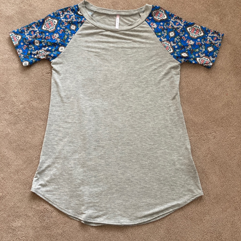 Woman’s Top by cool melon size S